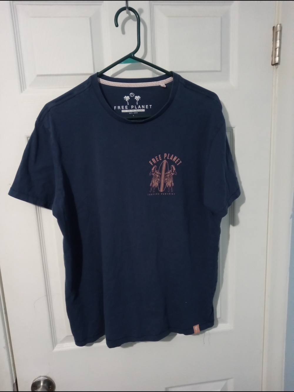 Free Planet Navy Tee with Pink Surfboard Graphic